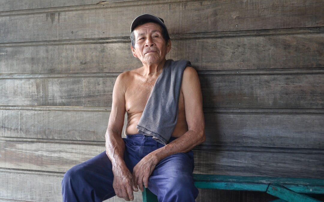 Photographer taking a personal portrait session of a local resident outdoors