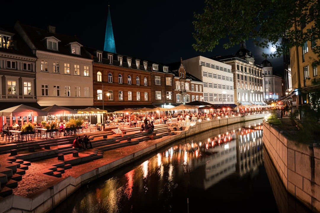 Vendors and shoppers at a lively street market in Aarhus Denmark